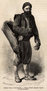 En vandvogn, omrejsende købmand poserer med sit udstyr, en slags tankkasse og en beholder, der bruges som mål og kop, i Roustchouk (Rumænien), gravering efter tegningen af Emile Bayard, der illustrerer rejsen til Bulgarien, af Guillaume Lejean, i af Emile Antoine Bayard