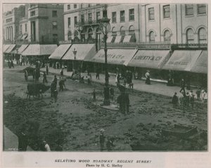 Relaying wood roadway Regent Street af English Photographer