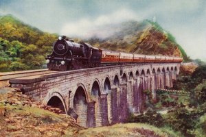 4-6-2 Dampflokomotive der Bombay, Baroda und Central India Railway, die den Frontier Mail über ein Viadukt zwischen Bombay und Delhi zieht