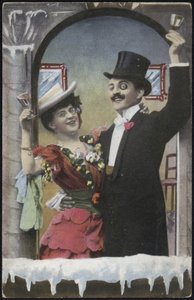 Et velklædt par afbildede grinende af English School