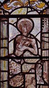 Fenster w1 zeigt Christus, der eine Taube trägt