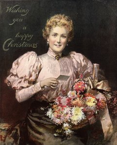 Kvinde holder en buket blomster, med legenden, ønsker dig en glædelig jul