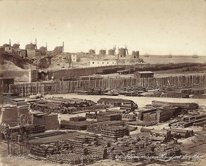 Værft til byggematerialer, vindmøller er i baggrunden, i Alexandria, Egypten af Félix Bonfils