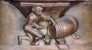 Udskæring, der forestiller en mand, der sætter en hane på en tønde, fra en korbod fra klosteret St. Lucien i Beauvais (træ)