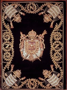 Omslag til en af de tolv originale udgaver af "Code civil des francais"" udstedt af Napoleon Bonaparte den 21/03/1804. Den er indbundet i fløjlsbroderi af guld og sølv med retfærdighedsemblem og kejserens våben. fransk lov om borgerrettigheder. B.N af French School
