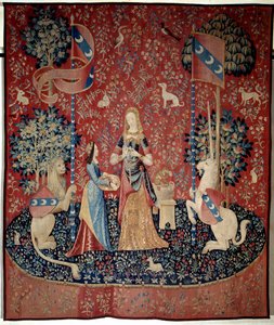Gardin af Lady to the Unicorn (Lady to the Unicorn): allegori af lugt. En ung kvinde, der holder en krone af nelliker, omgivet af en løve, en enhjørning, en abe, kaniner. Uld og silketæppe fremstillet mellem 1484 og 1500. Fra Chateau de Boussac, Cr af French School