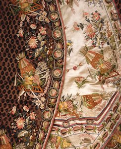 Detail of a magnificent suit of brown cut velvet, comprising coat, breeches & waist of ivory satin embroidered en suite, c.1760dani af French School