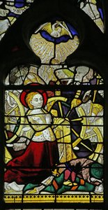 Vindue, der viser St. Catherine, der beder, og engle, der knækker hjulet ved at kaste med sten, 1460-70 af French School