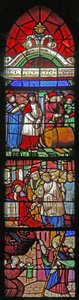 Vindue w19, der viser livet i St. Remi. Nedenfor: leverer en besat sjæl. Midt: tilbydes bispesædet i Reims (indgraveret) Ovenfor: vinens mirakel i Cernay af French School