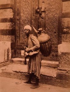 En egyptisk vandbærer (sepia-billede)