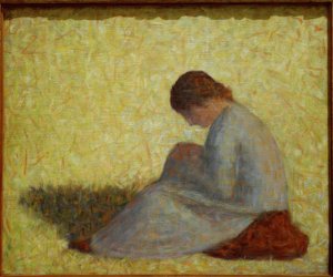 Bondekvinde sidder i græsset af Georges Seurat