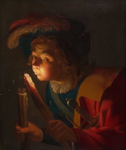 En dreng, der blæser på en ildsjæl af Gerrit van Honthorst