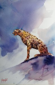 Gepard på en klippe
