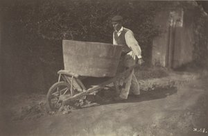 Mandlig bonde med trillebør, 1870.