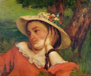 Kvinde i stråhat med blomster, ca. 1857