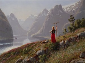 Pige med rive i fjordlandskab