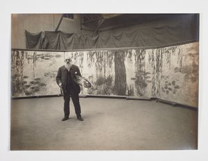 Claude Monet med sin palet foran sit værk 
