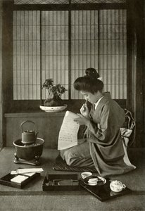 Skriver et brev, 1910. af Herbert Ponting