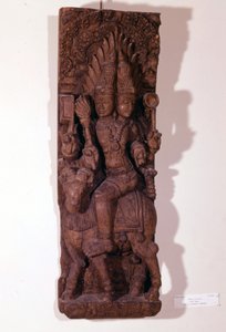 Agni, ildguden, afbildet med to hoveder (bicephal) på en vædder, ifølge hinduistisk mytologi. Træskulptur fra det 17. århundrede. Paris, Musée Guimet. af Indian School