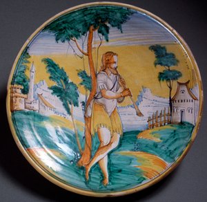 Renæssancekunst: pladedekoreret af en fløjtespiller (En fløjtespiller) - Slut 1500-tallets produktion af Viterbo (Viterbo), Italien Firenze, Museo Nazionale del Bargello af Italian School