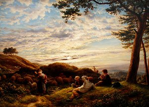 Hyrdedrenge passer deres flok ved solnedgang