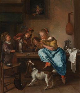Børn, der lærer en kat at danse, kendt som 