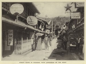 Gadebillede i Nagasaki med Jinrikishas til højre