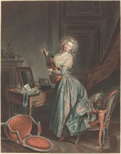 En kvinde, der spiller guitar
