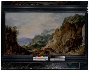 Et panoramisk bjerglandskab med svende, der giver til de fattige, pakkeheste hinsides