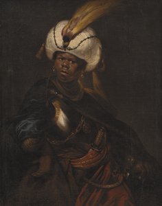 En mand iført turban og rustning