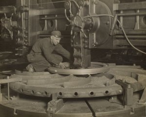 Arbejder ved slibemaskine af Lewis Wickes Hine