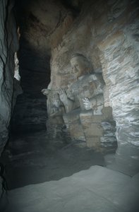 Kina, Shanxi-provinsen, sandstensstatue af Buddha i Yungang-grotterne af Unbekannt Unbekannt