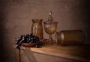 Druer i ravfarvet glas af Margareth Perfoncio