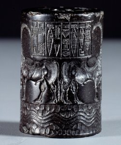Mesopotamien: cylindrisk segl i sort marmor i navnet på den guddommelige Sharkali-Sharri (Shakalisharri), kongen af Agade pryder med helte, der vander bøfler. 2300 f.Kr. Paris, Louvre-museet af Mesopotamian Mesopotamian