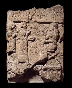 Mesopotamien: kalkstensrelief af skriftkloge, der tog byttet under plyndringen af Musasir. fra Sargon II