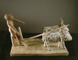 Begravelsesmodel af en plovmand, der leder sin plov tegnet af to okser (malet træ)