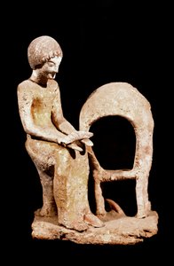 Mykensk kunst: kvindeskikkelse i en ovn med et brød i hånden. 16. århundrede f.Kr. Strasbourg, arkæologisk museum af Mycenaean