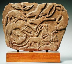 Relief af hunde, der fælder en ko, 4.-5. århundrede (sandsten) af Nubian Nubian
