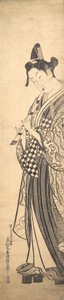Ung mand, der går mod venstre på High Geta og spiller på fløjte, mens han går, ca. ..., ca. 1745. af Okumura Masanobu
