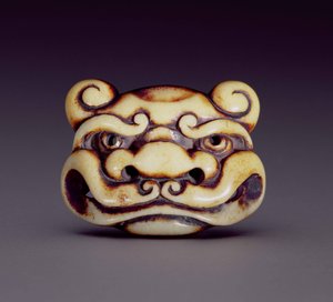 Netsuke skildrer ansigtet af en oni-dæmon, ca. 1870 (hjort-gevir)