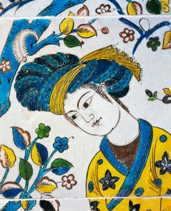 Ung mand med turban, leger i haven, detalje fra keramisk flise fra Chehel Sotoun, Isfahan, persisk civilisation af Persian School