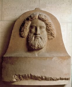 Fønikiernes civilisation: menneskehoved udskåret på en fønikisk sarkofag. 4. århundrede f.Kr. Marmor reliefstrømper. Svag. 80 cm Paris, Louvre-museet