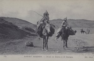 Rejsende i den algeriske Sahara på vejen fra Biskra til El Kantara (s/h-billede) af Photographer French