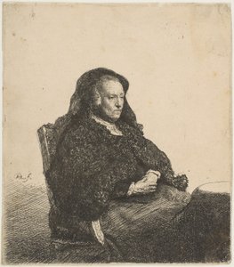 Kunstnerens mor sidder ved et bord og ser rigtigt ud: Trekvart længde, ca. 1631. af Rembrandt van Rijn