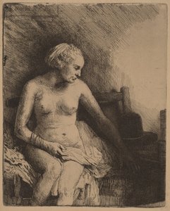 Kvinde ved badekarret med en hat ved siden af sig af Rembrandt van Rijn