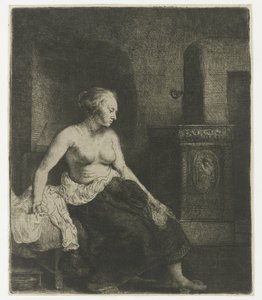 Kvinde sidder halvt påklædt ved siden af et komfur af Rembrandt van Rijn