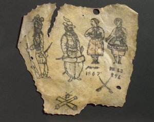 Menneskehud, tatoveret med figurer, sandsynligvis fransk af John Pardon