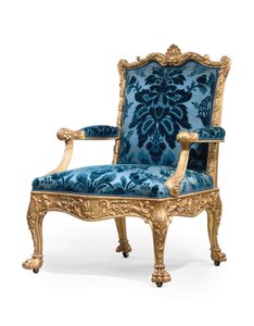 En af et par George III lænestole af forgyldt træ af Robert Adam