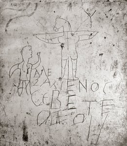 Blasfemisk graffito af en korsfæstelse (sten)