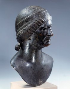 Romersk kunst: bronze kvindes hoved. Begyndelsen af det 1. århundrede e.Kr. Paris, Louvre-museet af Roman